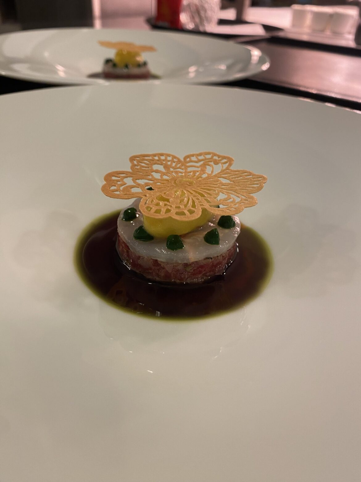 Steak tartare,langoustine,parsley creme, piccalilly sorbet, onion crisp and a smoked soy vinaigrette