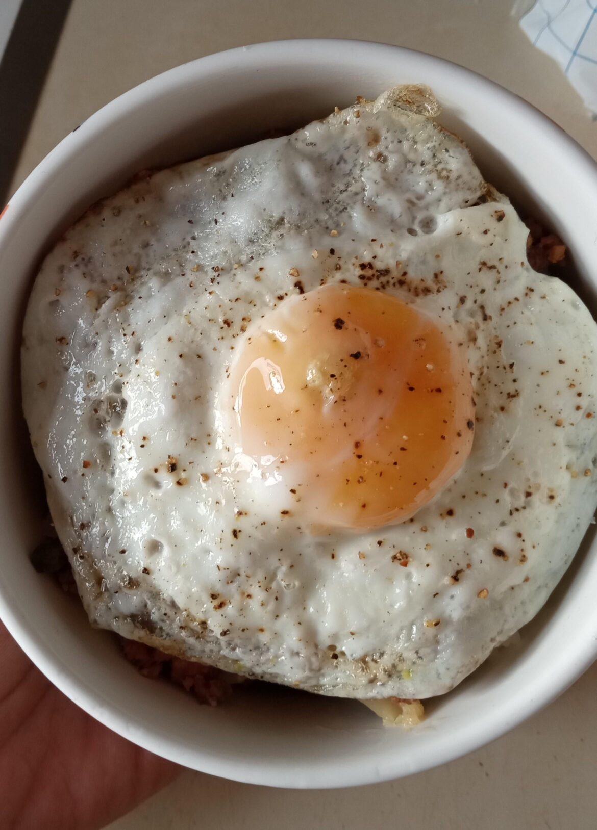 What lies beneath is of little importance. What matters is there is an egg on it.