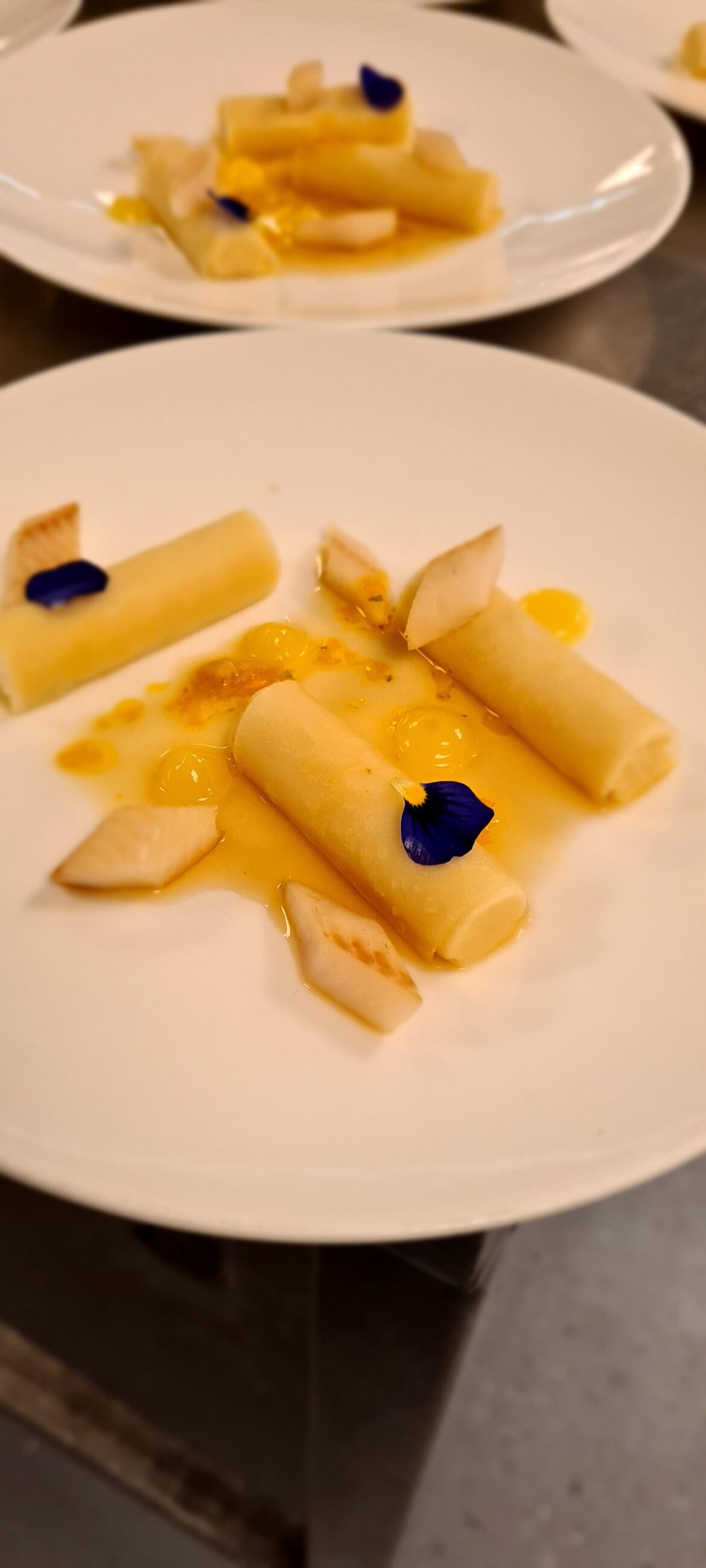 Celery pure roled in thin slice Celery root,smoked trout peaces,honey mustard sauce and Safran sauce