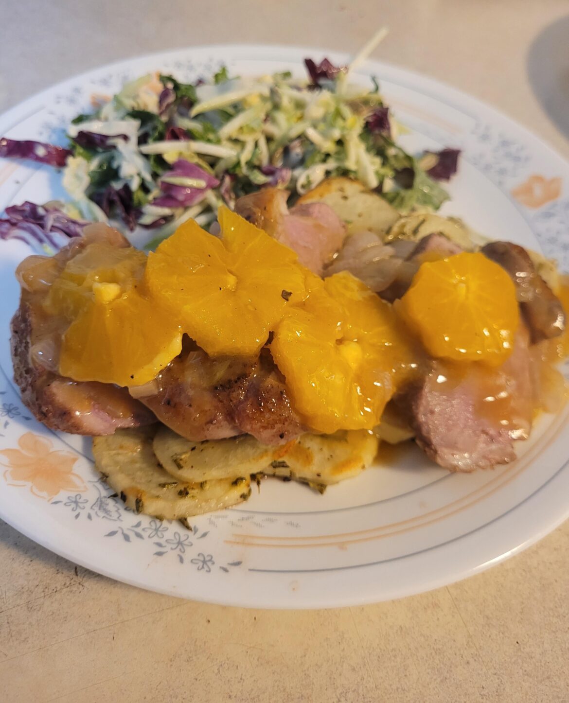 Seared Duck Breast with Apricot Orange Sauce Over Rosemary Medallion Potatoes