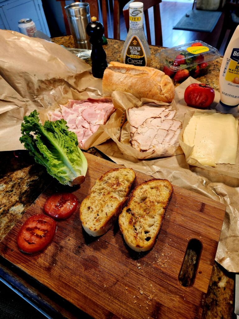 Smoked Turkey, and Rosemary Ham on fresh baked ciabatta loaf.