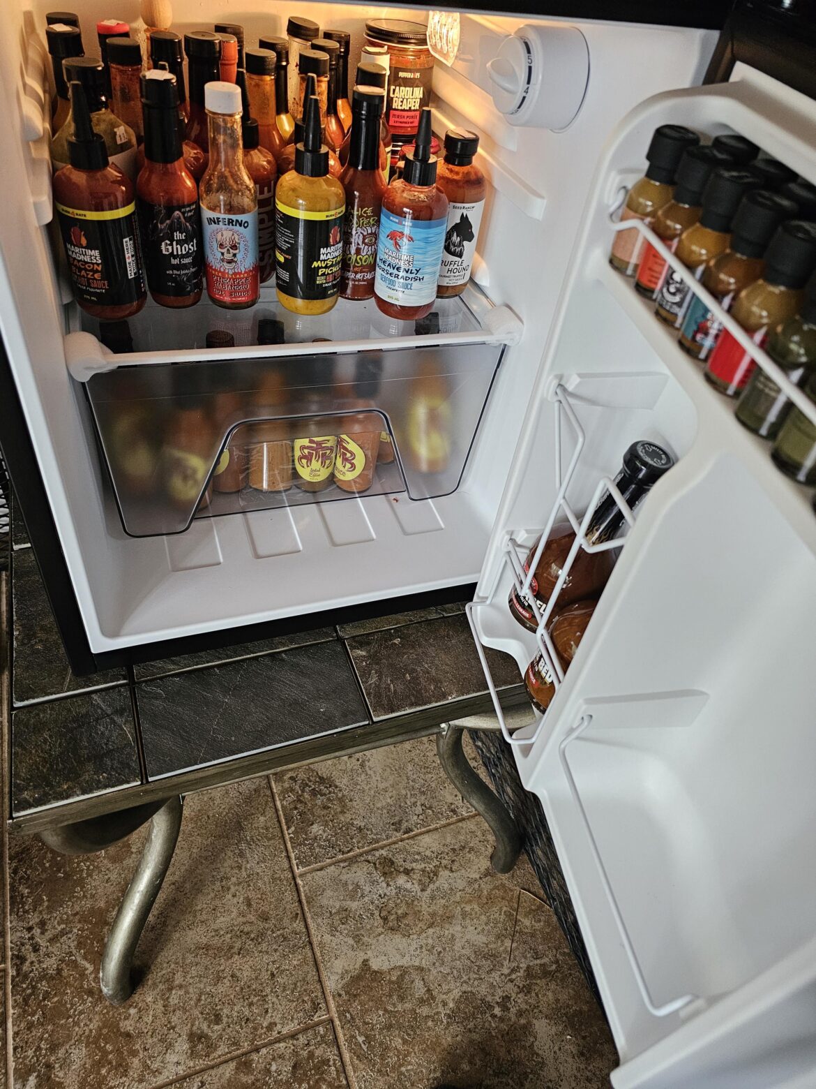 My hot sauce fridge. I have a problem. I need a bigger fridge.