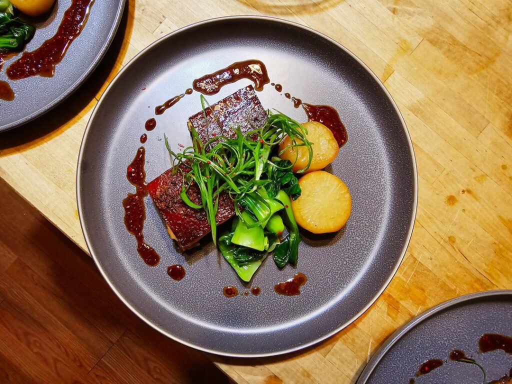 Day off. buta no kakuni, furofuki daikon, mustard greens. also some udon with katsuo dashi and kaeshi