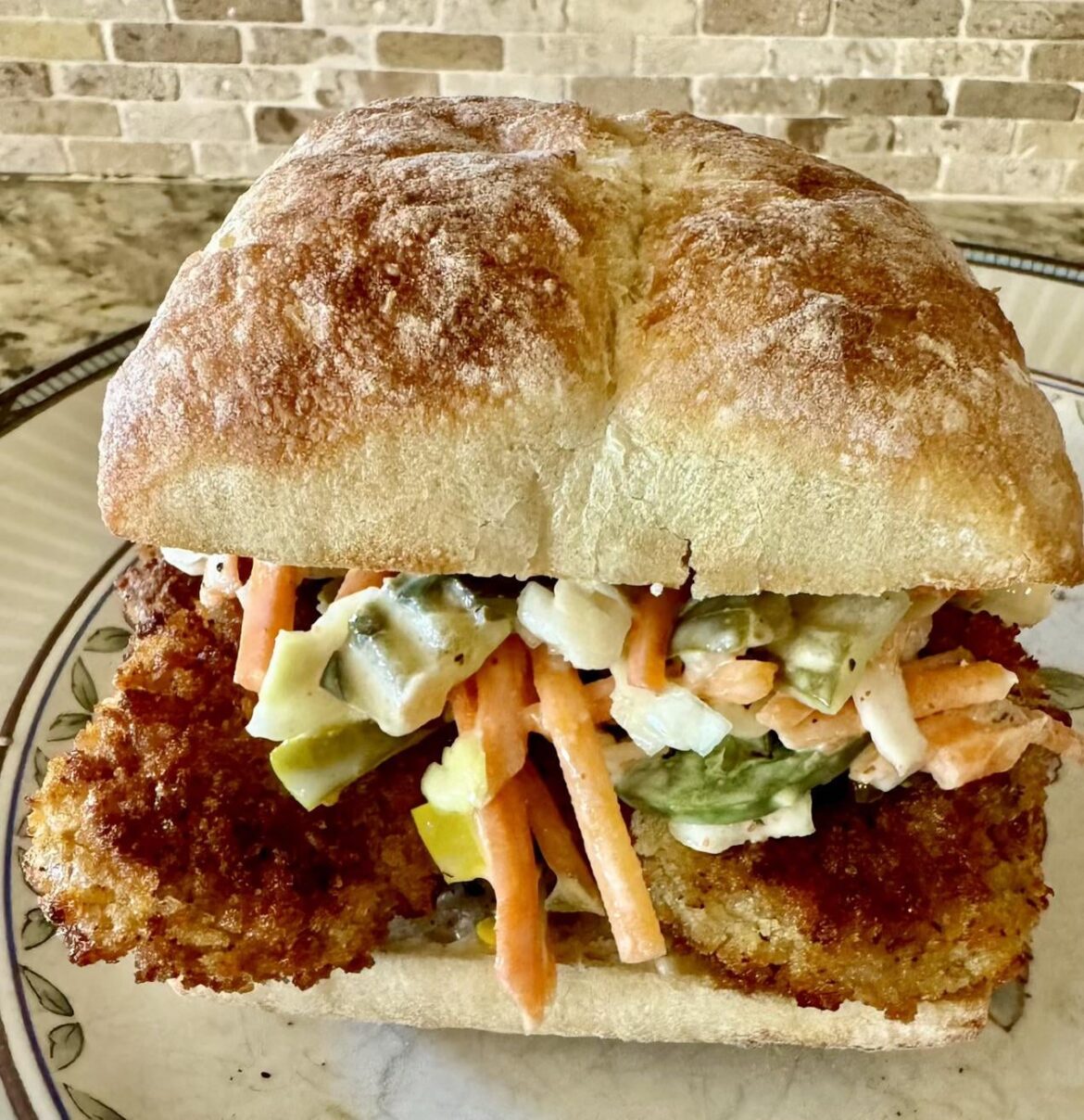 Fried Pork cutlets with spicy slaw on ciabatta