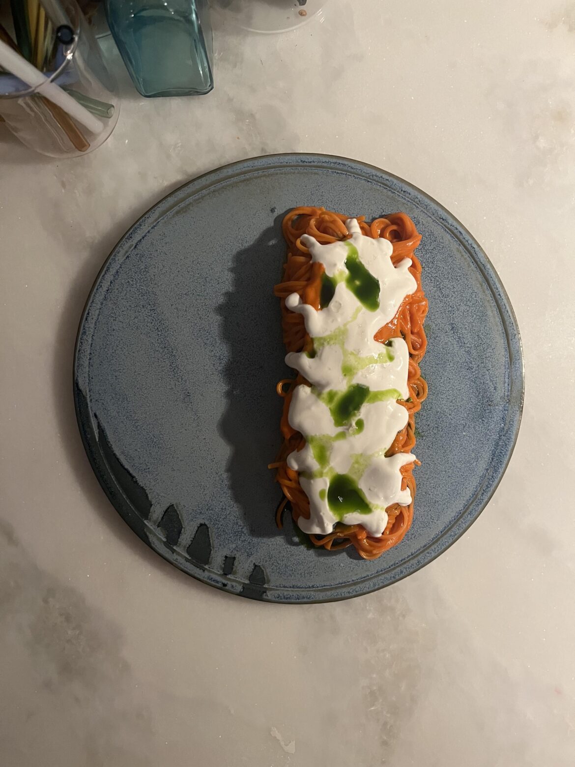 Fresno chile tomato sauce and parsley oil