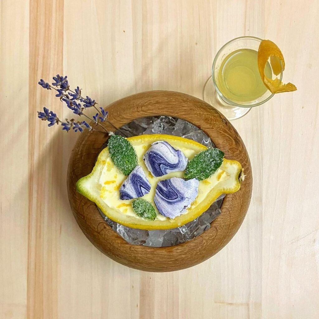 Lemon Yuzu Posset, Lavender Meringue and Candied Mint Leaves served with Amalfi Limoncello
