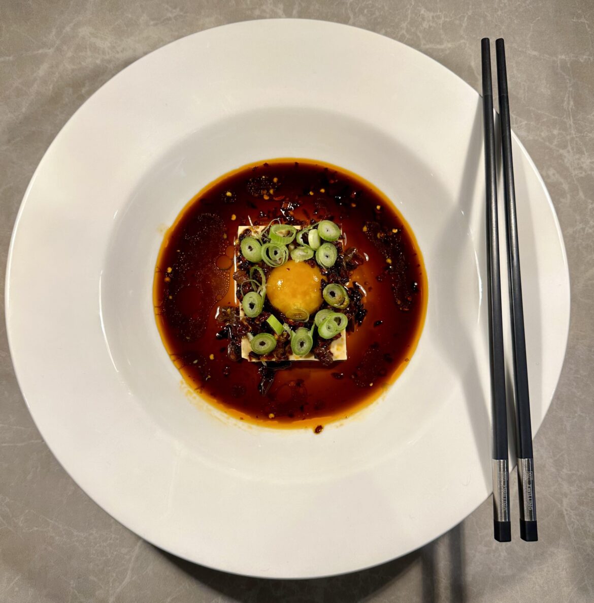 Cured egg yolk, tofu, chilli soy sauce, spring onion