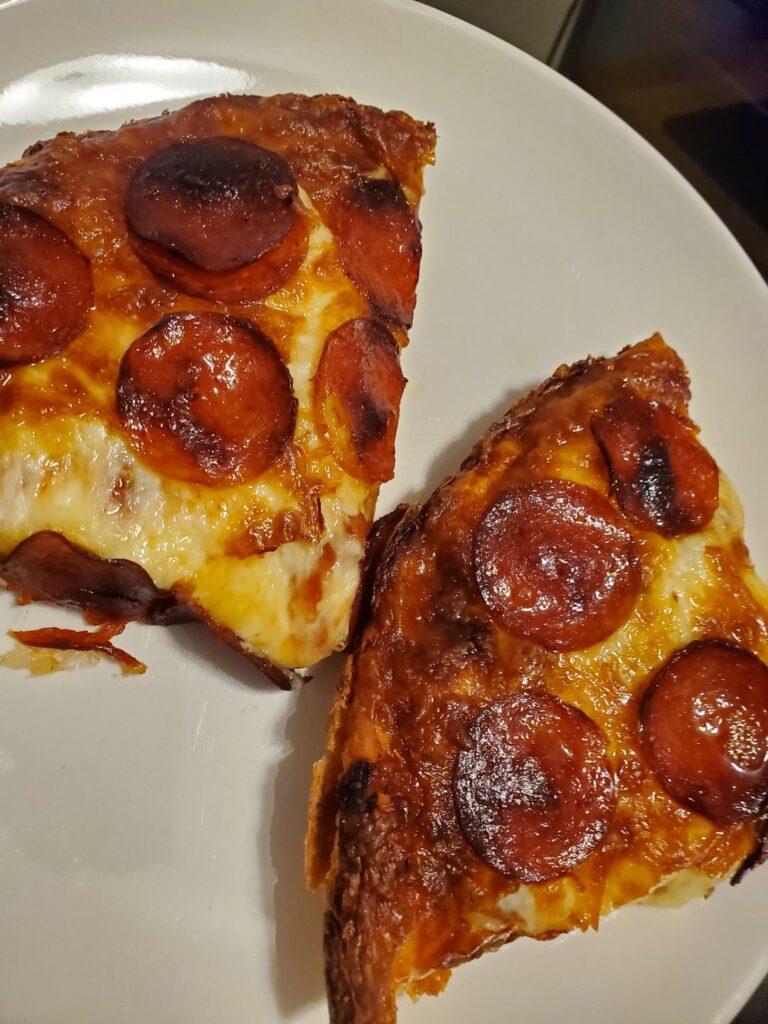 Made a semi-deep dish pizza in a stainless steel pan. This classify as Detroit style pizza?