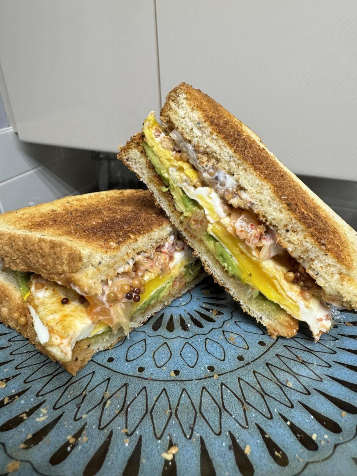 Everything Spice Bread | Avocado | Fried Egg | Whole Grain Mustard | Kimchi | Mayo | Everything Spice Bread.
