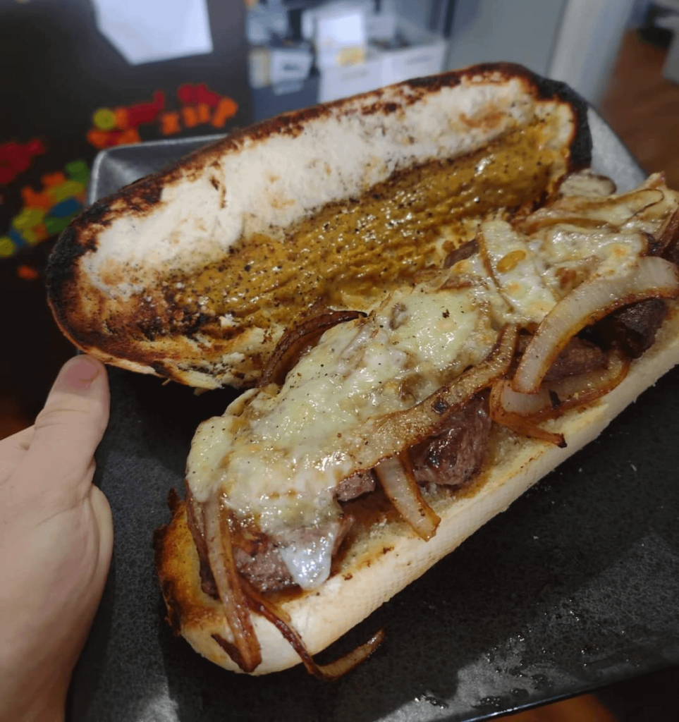 New jar of hot mustard calls for a steak sandwich.