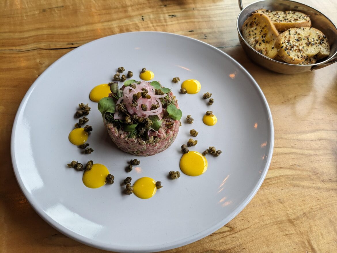Beef Tartare, Pickled Shallots, Fried Capers, Sous Vide Yolk Puree, Everything Bagel Crostini