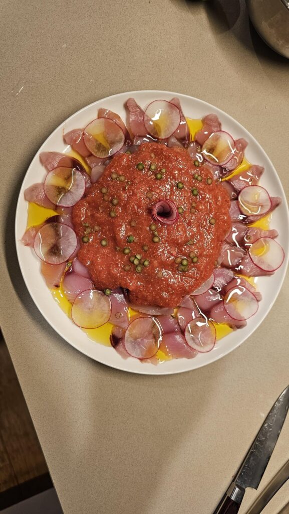 Bonito crudo, fig, lime, garlic shoots, radish and olive oil