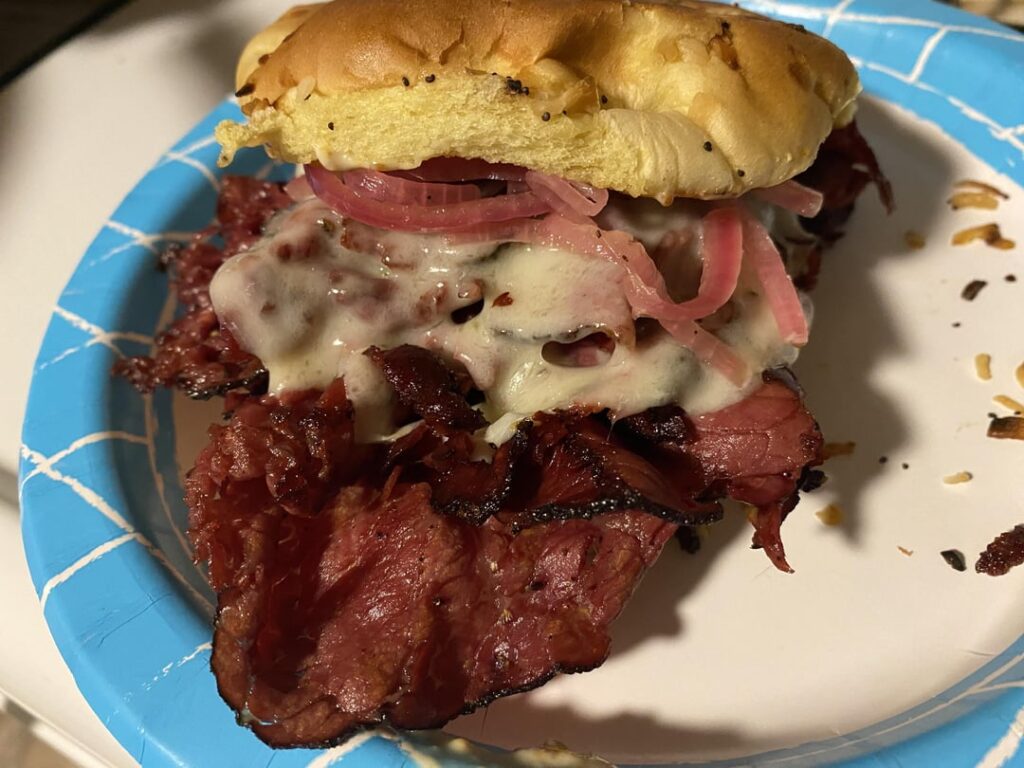 Pastrami on onion roll. Provolone, Homemade horseradish Mayo and pickled red onion