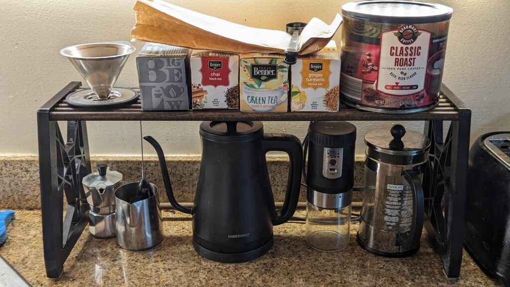 Nothing too impressive, but I just made a custom shelf for my coffee and tea station with 3D printing, red rising themed if you know that book series