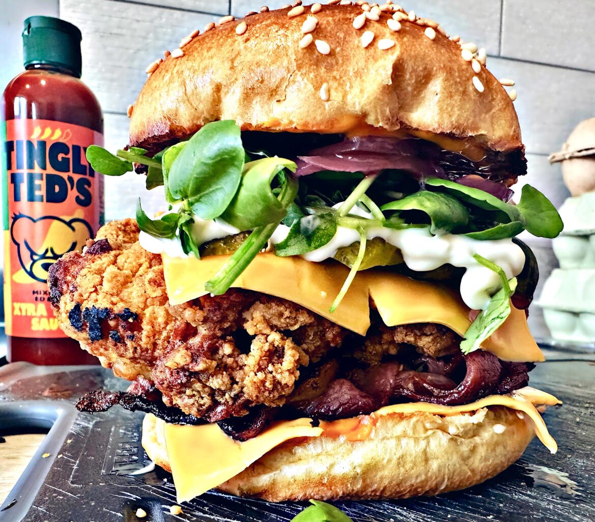 Buttermilk fried chicken sandwich. Burger cheese. Pickled shallots. Gherkins. Crispy smoked bacon. Rocket and watercress. Aioli. Bosh!