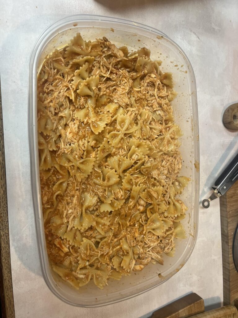 Bow tie chicken pasta !! Cooked on low for 8 hours. Topped with mozzarella cheese