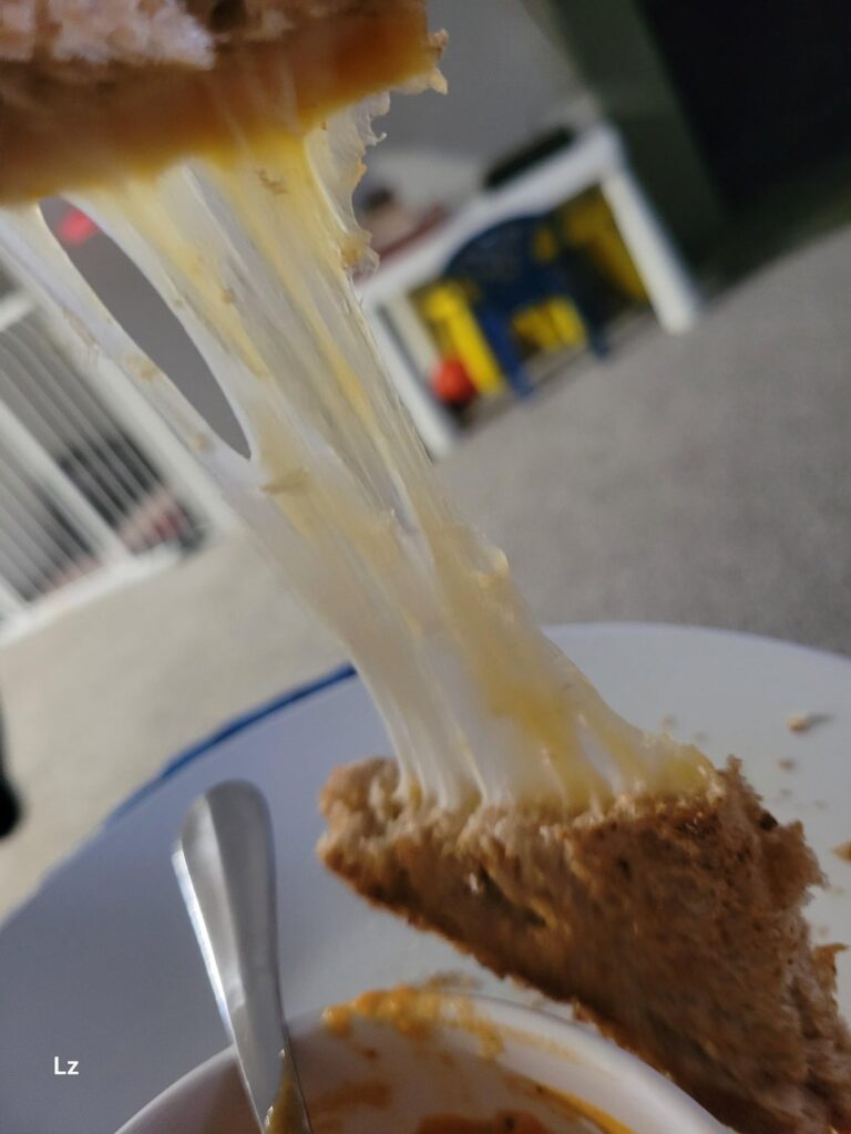 Havarti and cheddar cheese pull