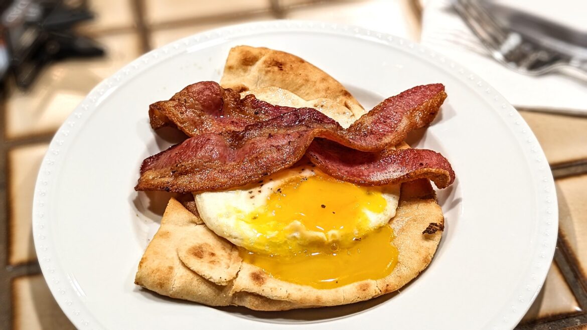 Egg and bacon on naan bread
