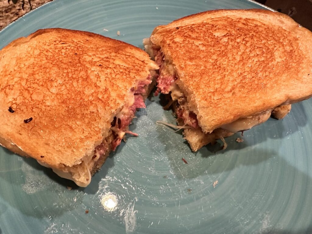 Made this sandwich twice in one day. Corned beef, pepperjack cheese, grilled kraut, and brown mustard on sourdough.