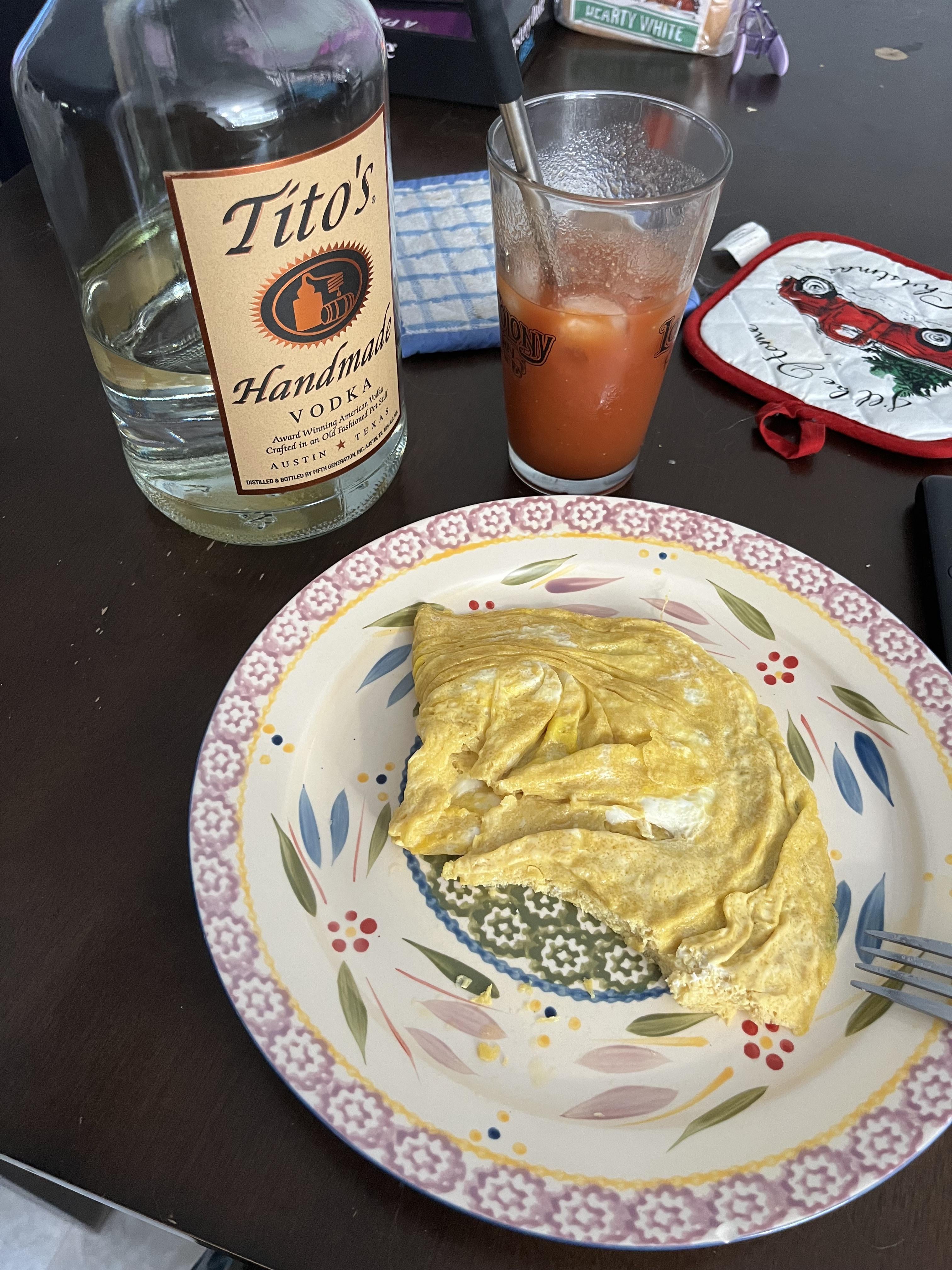Alright round 2. Scrambled eggs with Bachan’s sauce and Tito Bloody