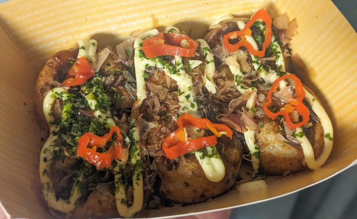 Making frozen takoyaki more insteresting with ghost pepper slices