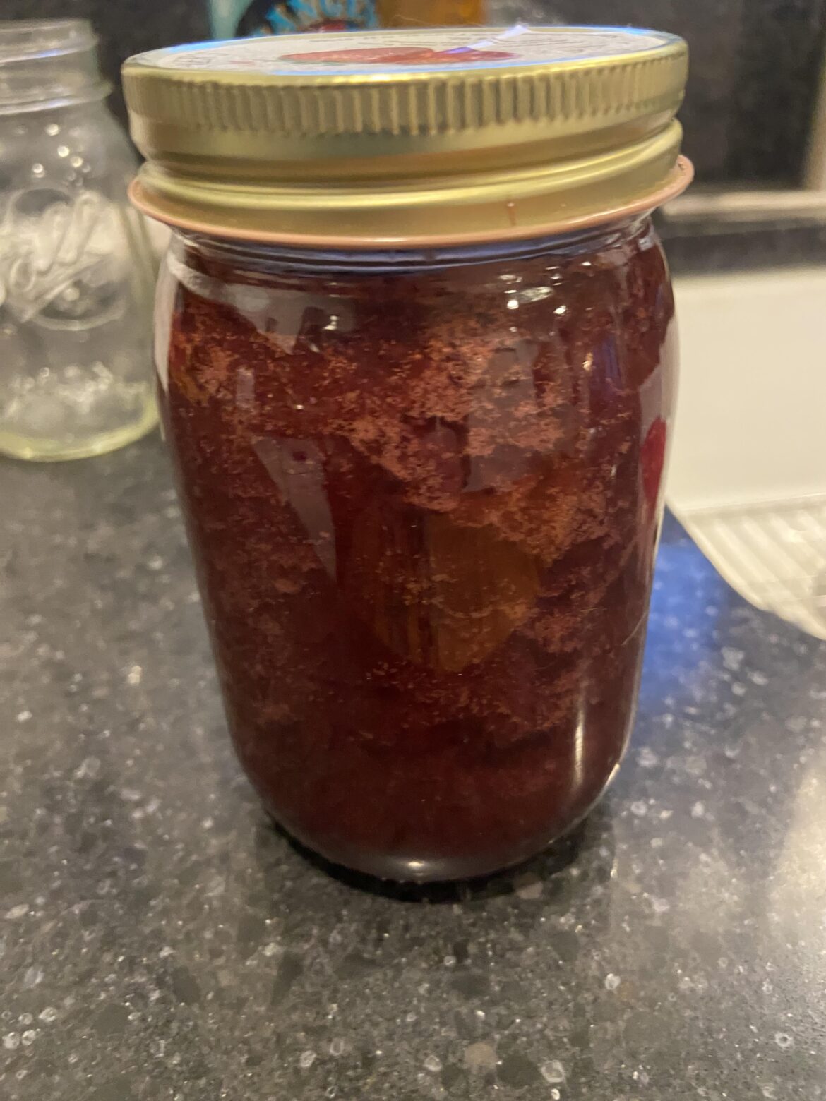 Bubbles in ‘commercial’ strawberry jam - safe to eat?