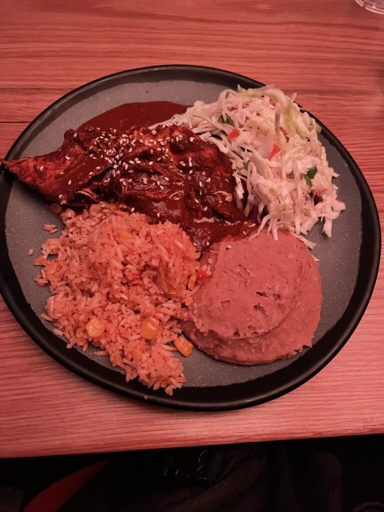 Can you help me with this Mexican food and sopapilla? Chicken Mole plate