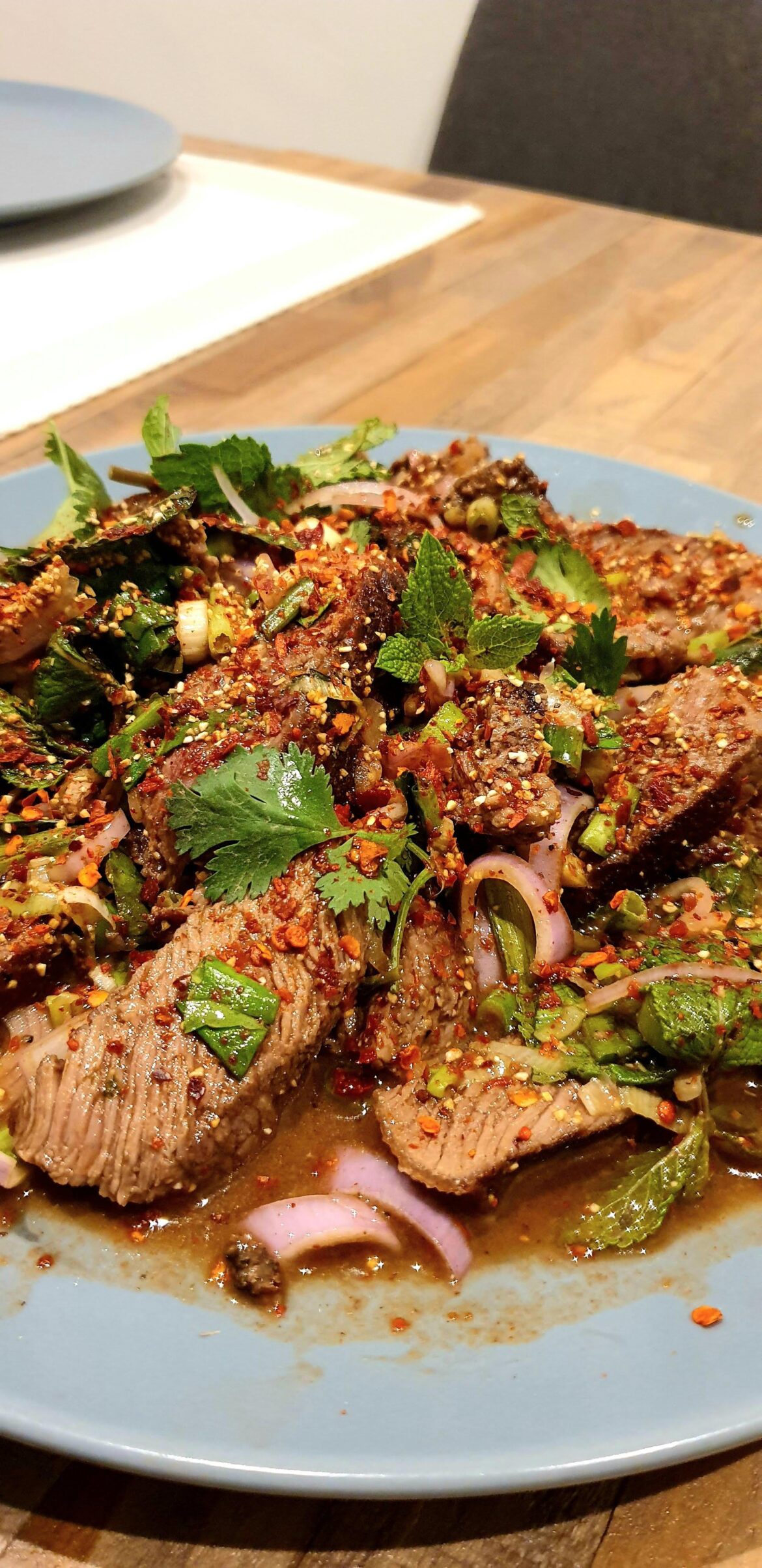 Made Thai fiery "waterfall" beef with sichuan chili powder and crushed Thai chili flakes 🌶️🌶️🌶️