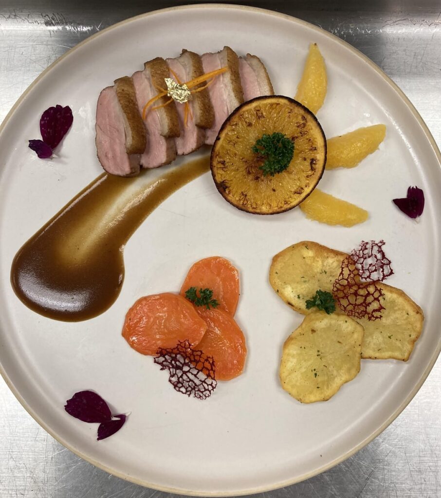 Roasted duck with orange sauce