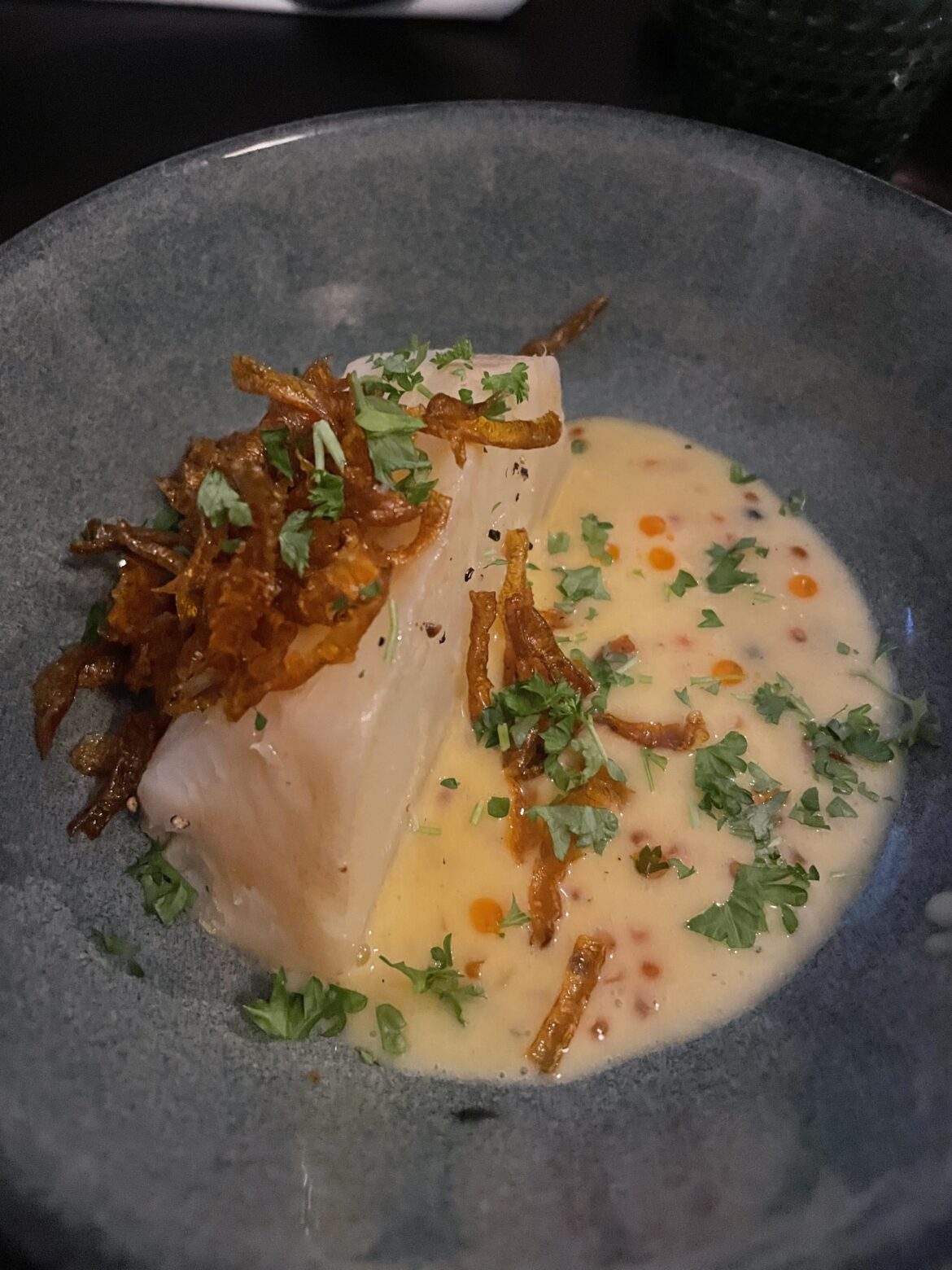 Oven baked & pan seared selleryroot, Beurre blanc with roe and fried carrot skin on top + a dash of chili oil.