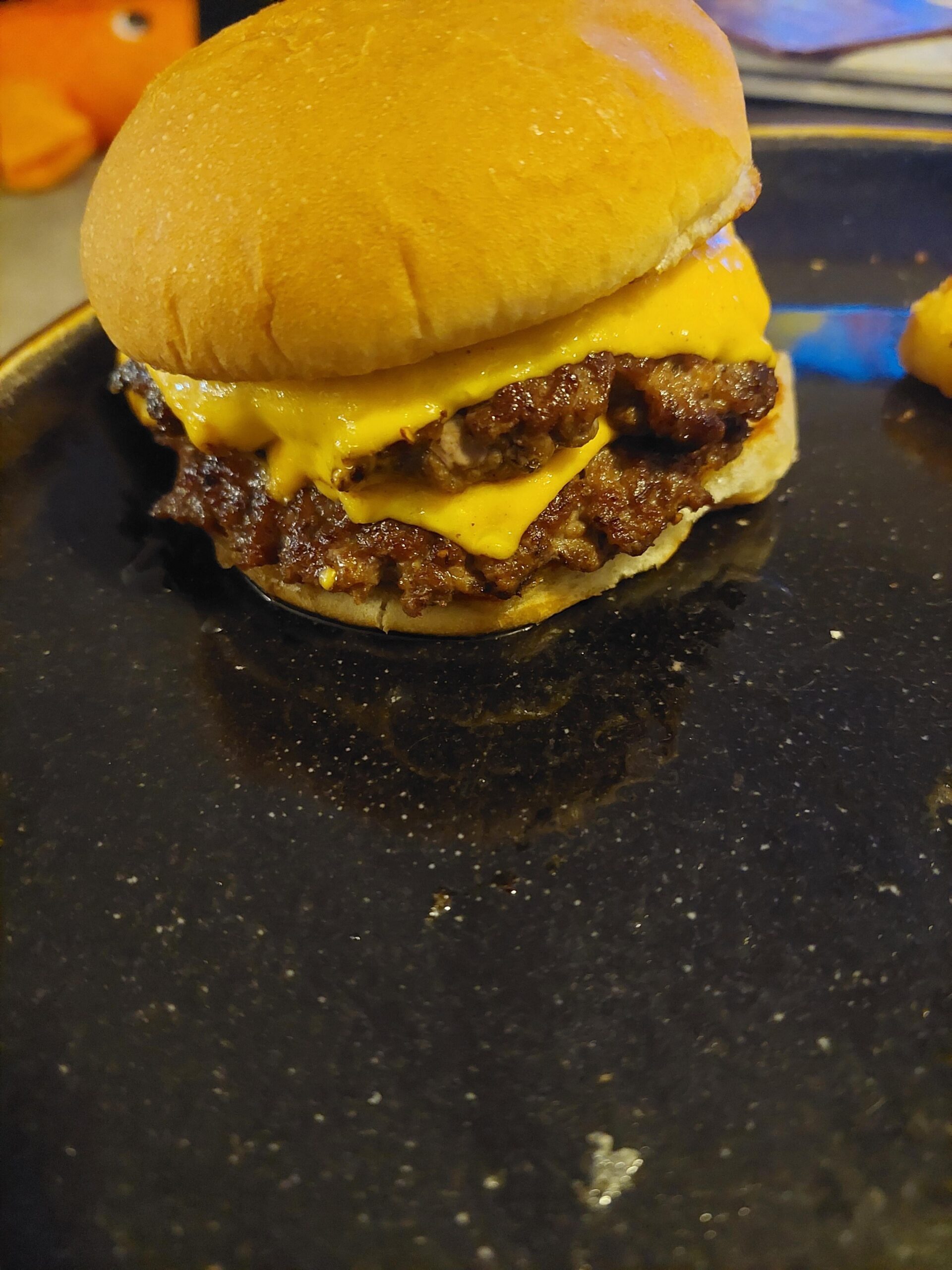 Double. 73/27, american, salt, pepper, toasted bun. Simple but juicy