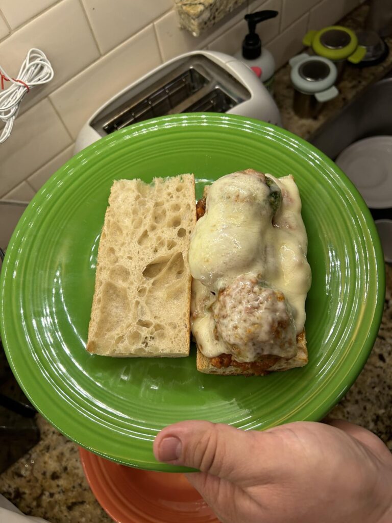 Home-made meatball sub that my fiancé created