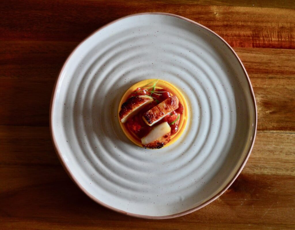 Lavender-Grilled Scallop, Carrot Panna Cotta, Chili Marmalade, Roasted Chili & Vanilla Vinaigrette