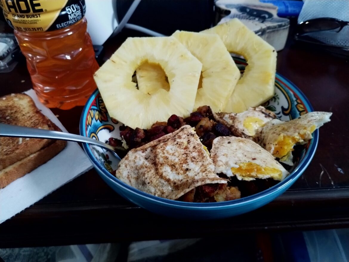 Over medium eggs on top of breakfast Hash