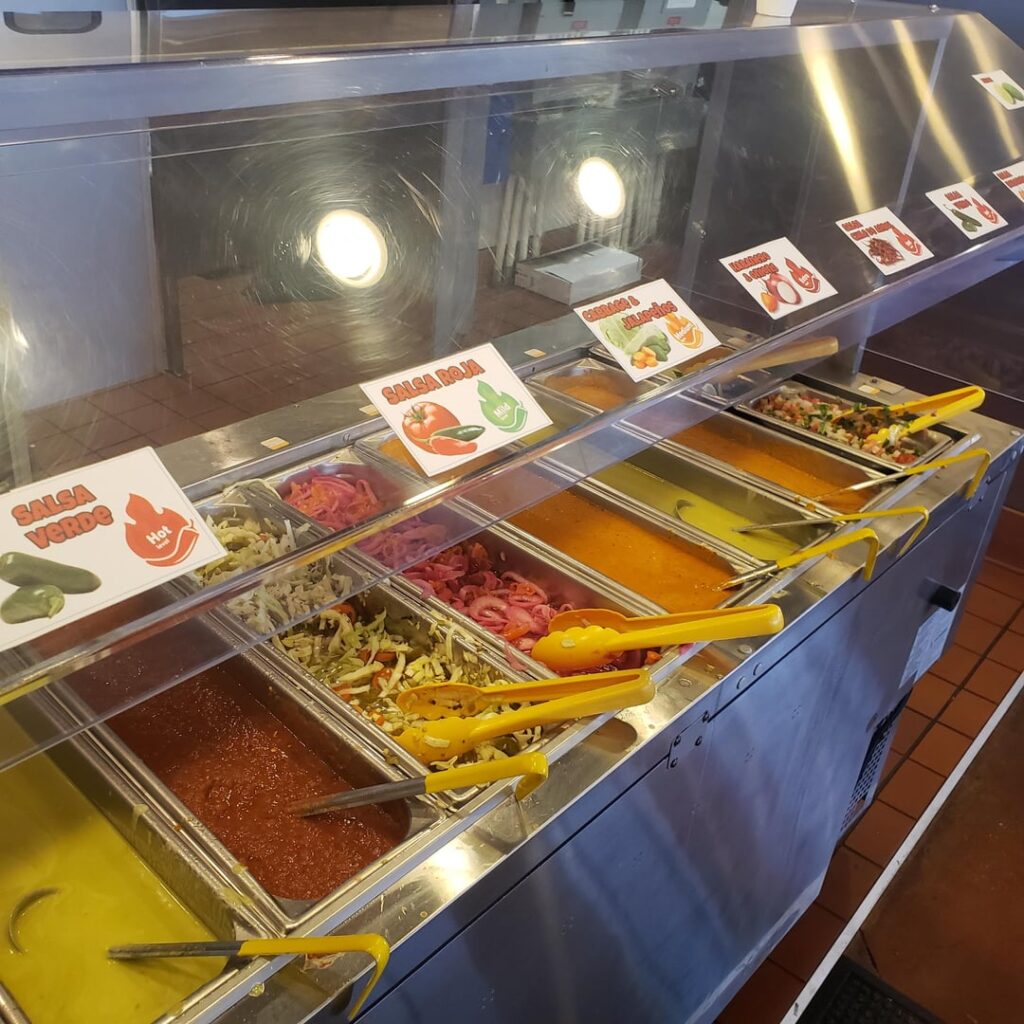 Pollo Regio salsa bar. They have house made fried chips too.