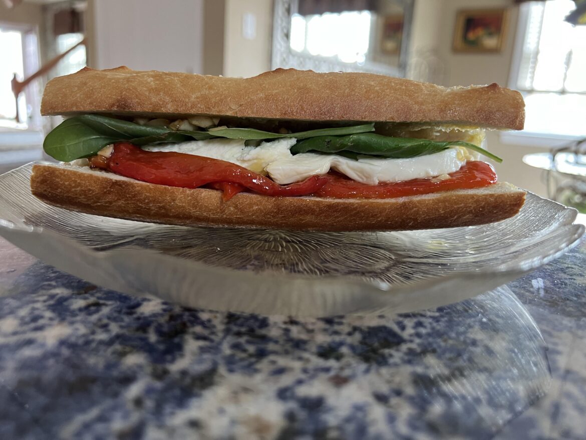 Roasted red pepper, garlic, olive oil, fresh mozz and fresh basil on French baguette