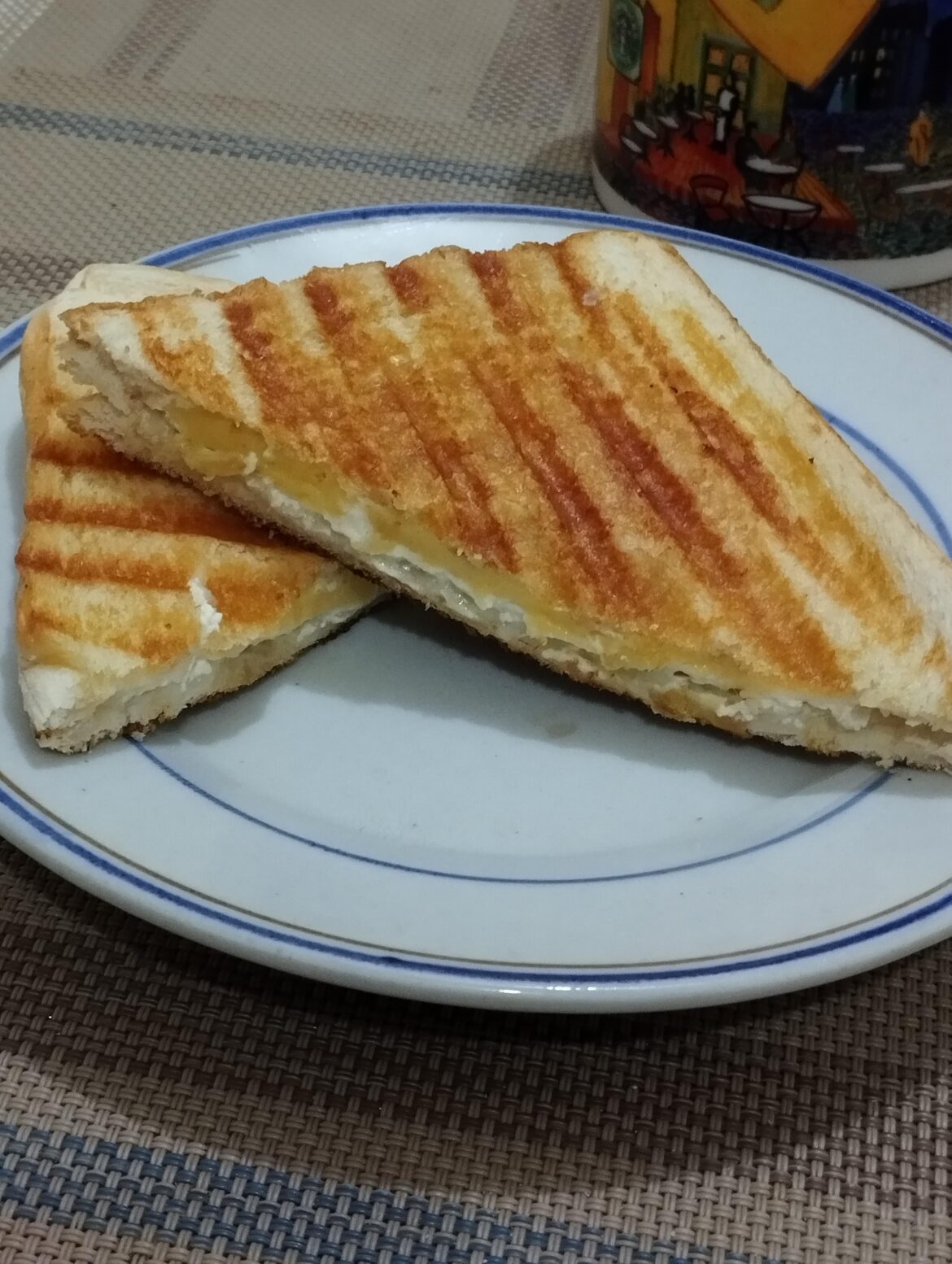 My lunch for today. Made with homemade yogurt cheese (yogurt strained for 24 hours +) and local processed cheese.