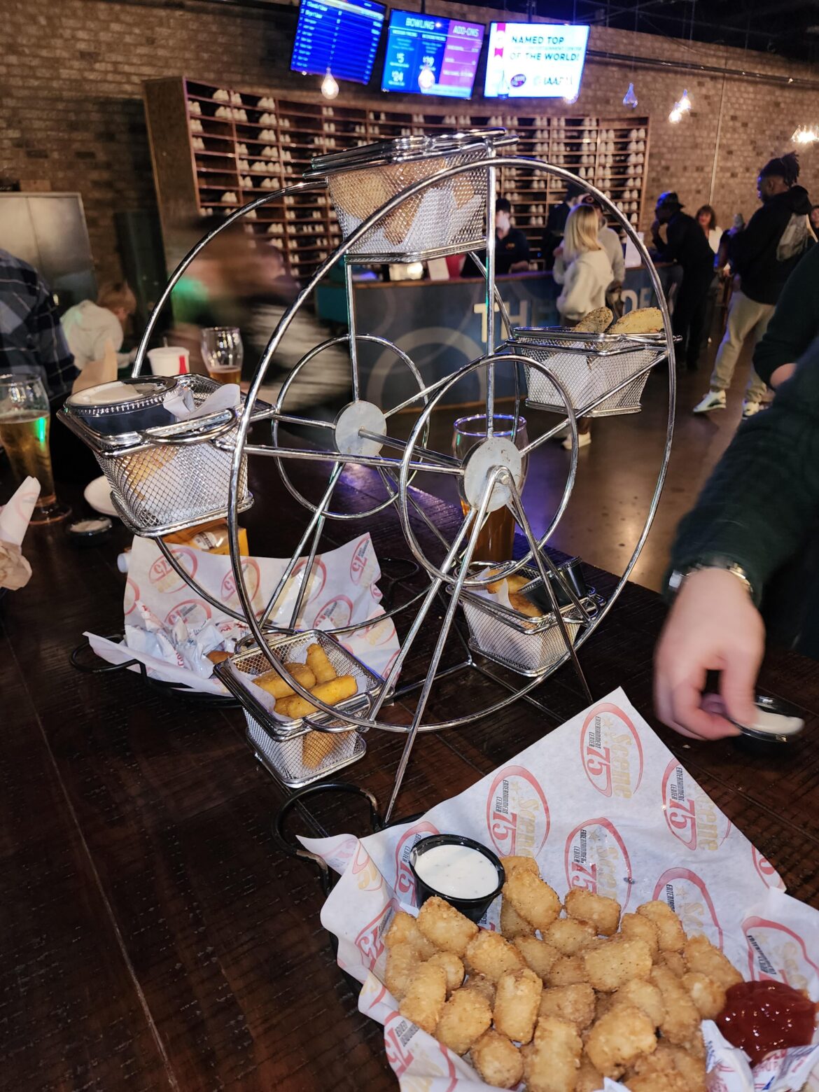 We were served an appetizer sampler in a ferris wheel