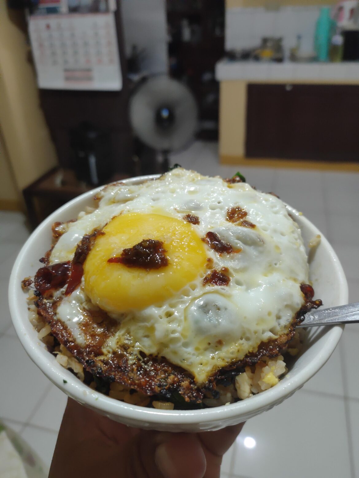 Spicy Pork Chaofan with Crispy Fried Egg cooked in Chilli Oil