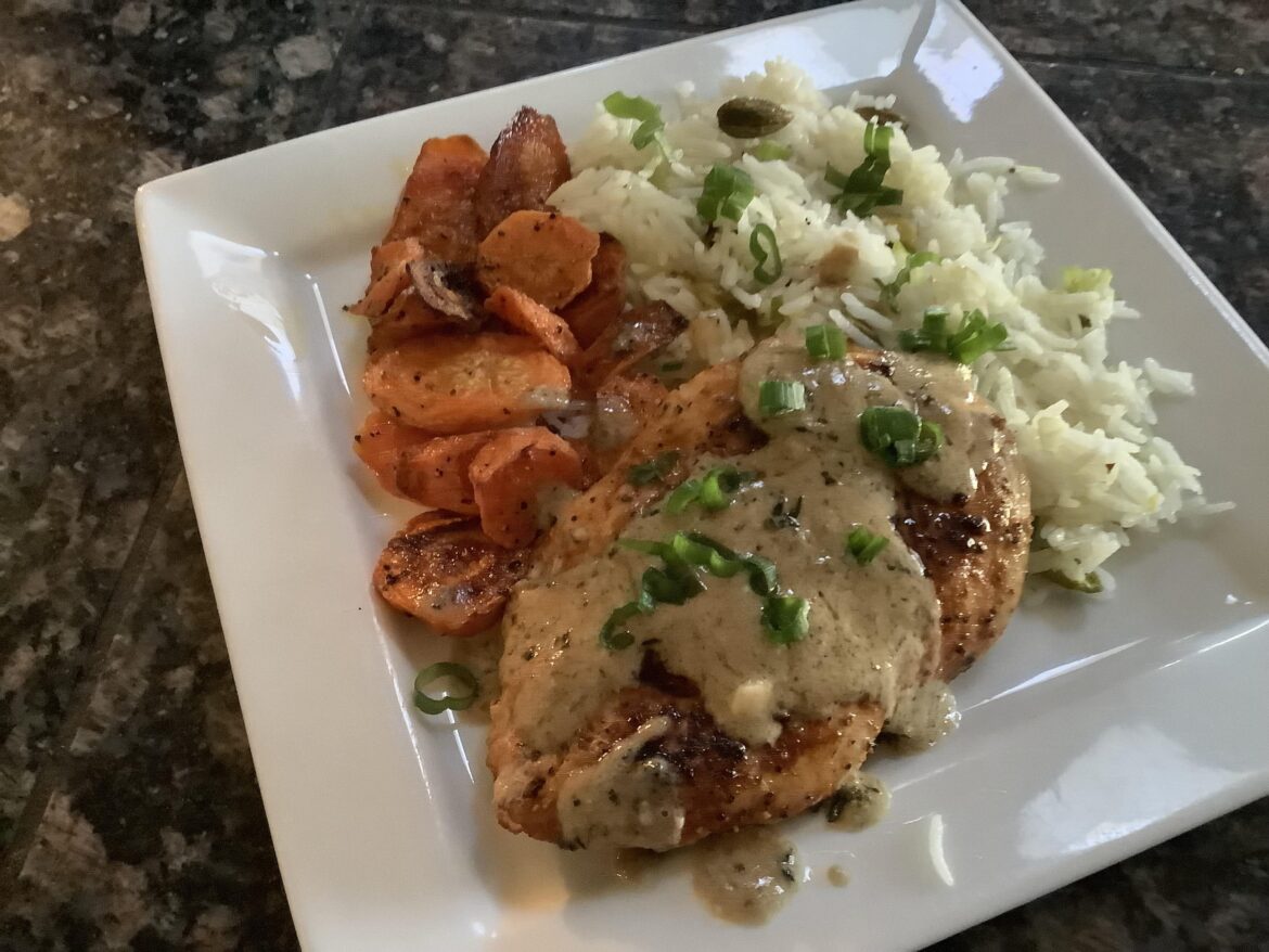 Paprika Chicken in lemony sauce , basmati rice with pistachios