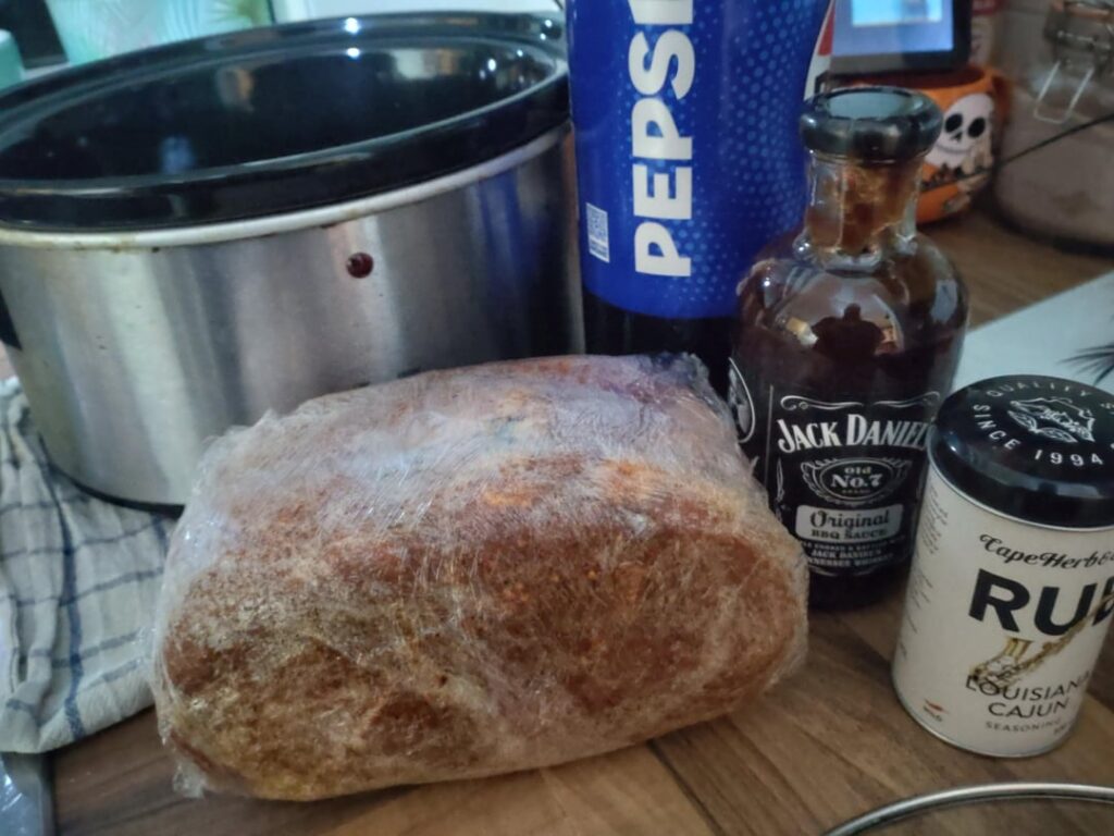 Slow cooked pulled pork I wrapped in spices for over 12 hrs. Now it's time to cook for another 12hr.