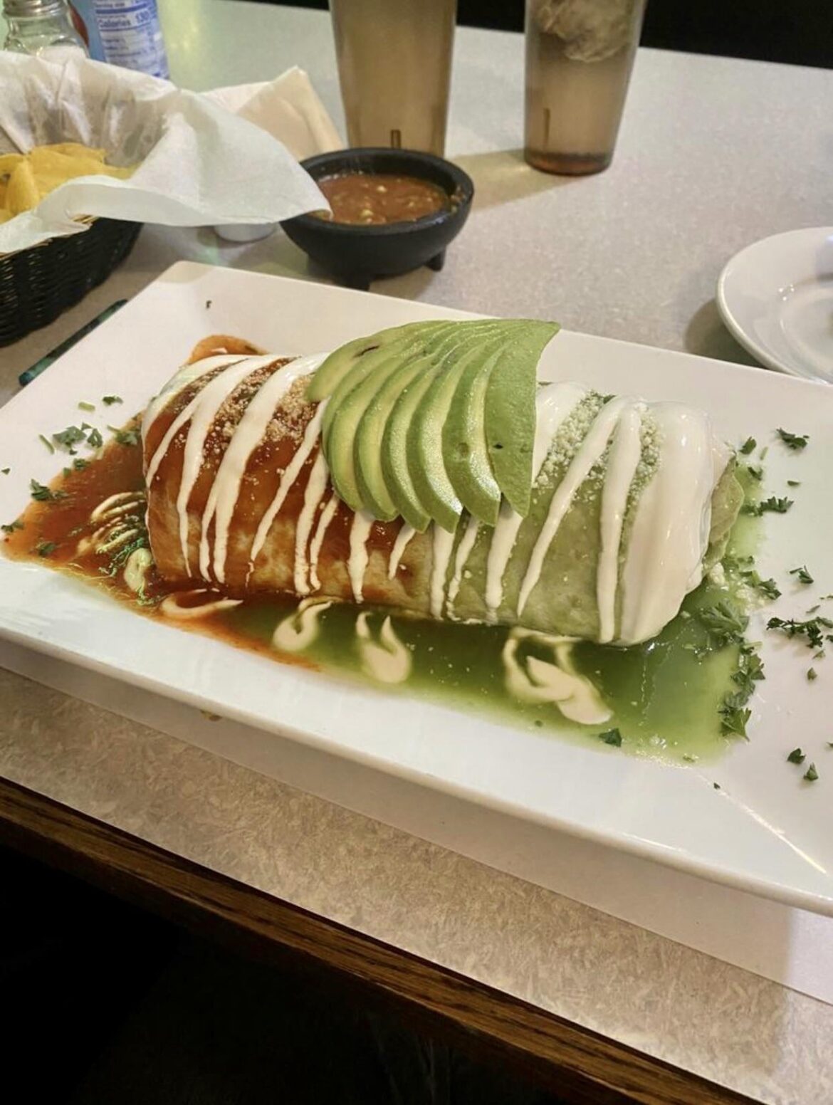 Chorizo Burrito at my local hole in the wall Mexican spot - the rojo is 🔥 almost literally