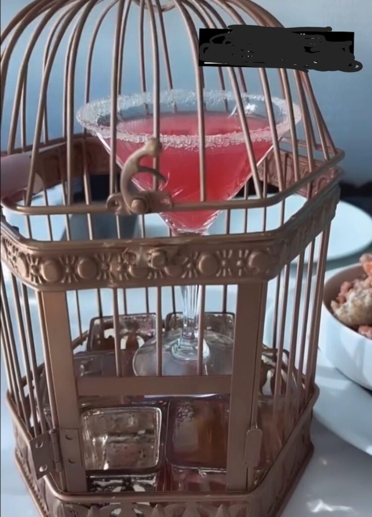 Margaritas in a birdcage