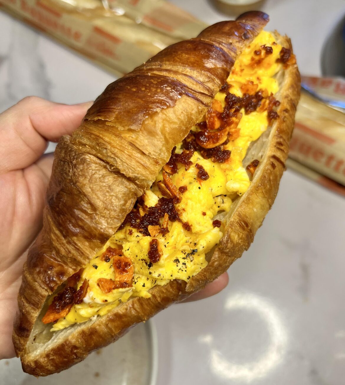 Egg and Chili Crisp on Croissant