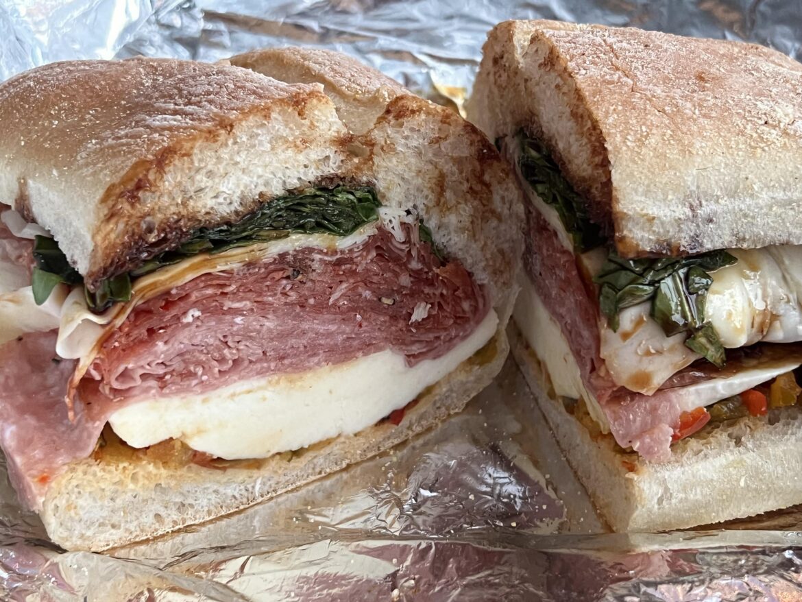 The local Italian deli served up some thick cuts of fresh mozzarella for this Italian sandwich on ciabatta