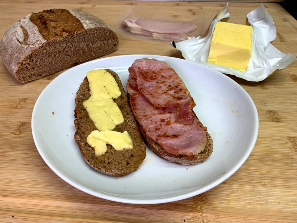 Homemade dry cure bacon on fresh baked sourdough rye