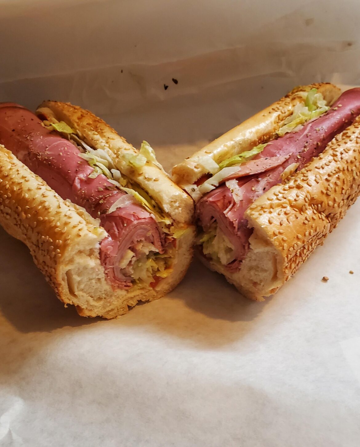 I ate Italian hoagie with aged provolone cheese on seeded hard roll.