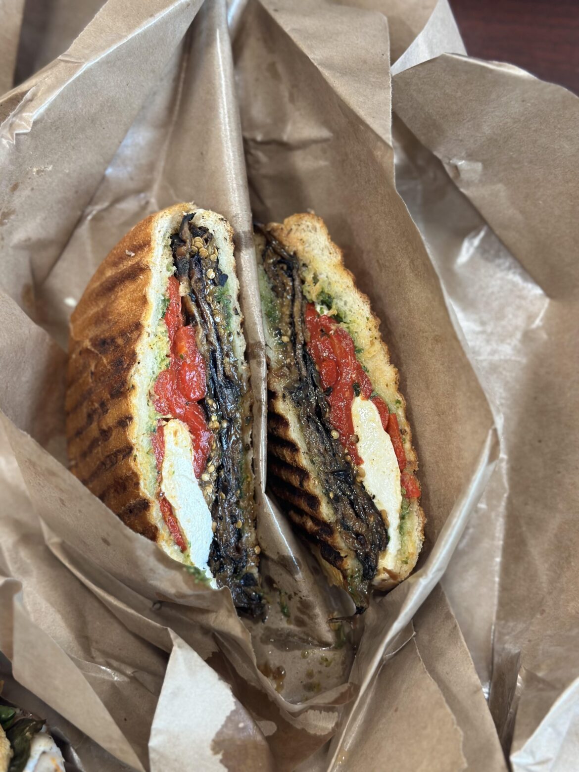Red pepper mozzarella roasted eggplant pesto evoo