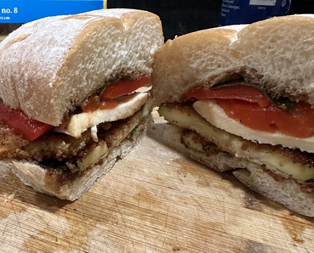 Breaded Zucchini, Fresh Mozz, roasted red pepper, basil on a Portuguese roll Breaded Zucchini, Fresh Mozz, roasted red pepper, basil on a Portuguese roll