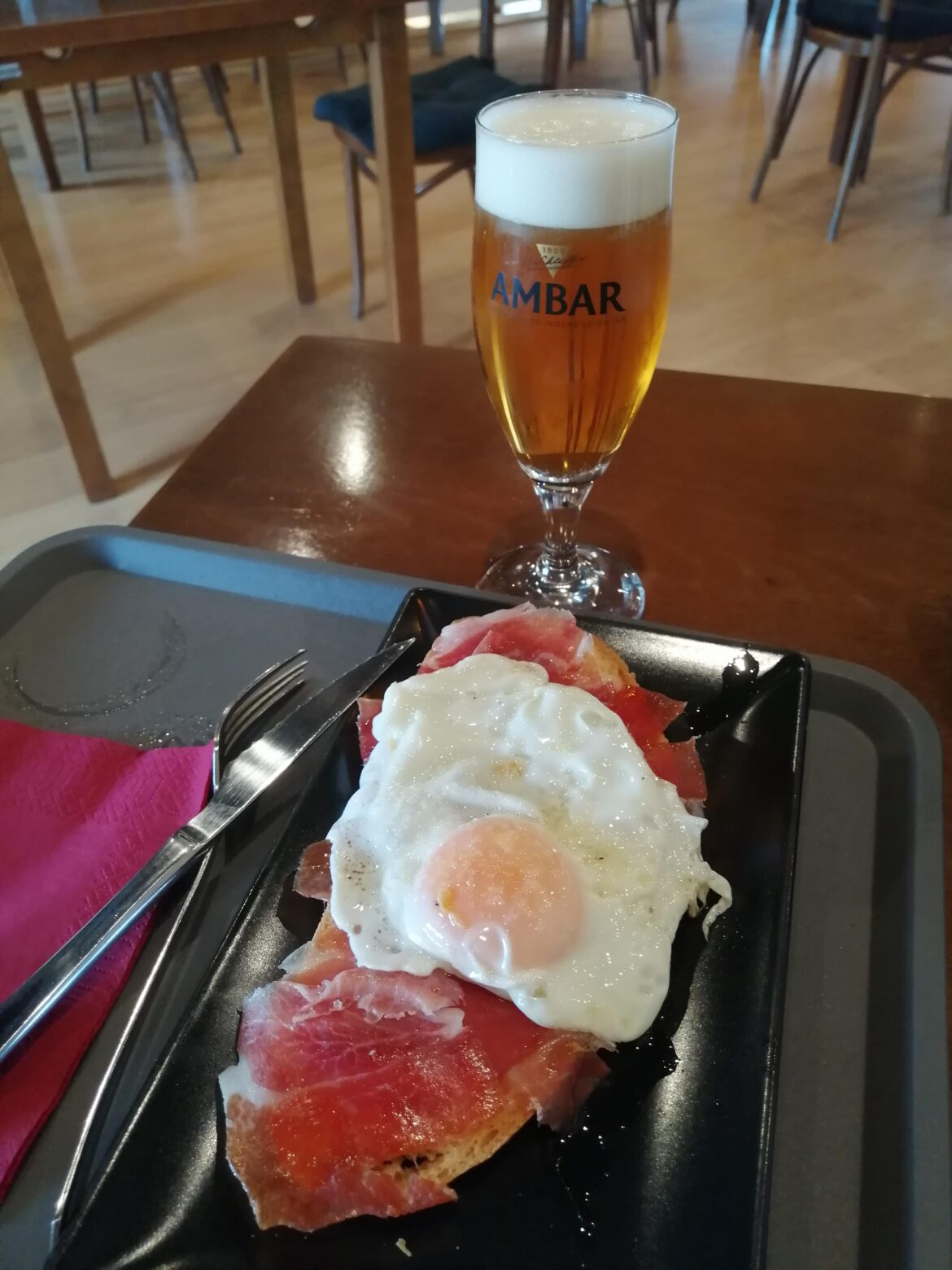 Spanish serrano ham with egg fried in olive oil.. And beer..